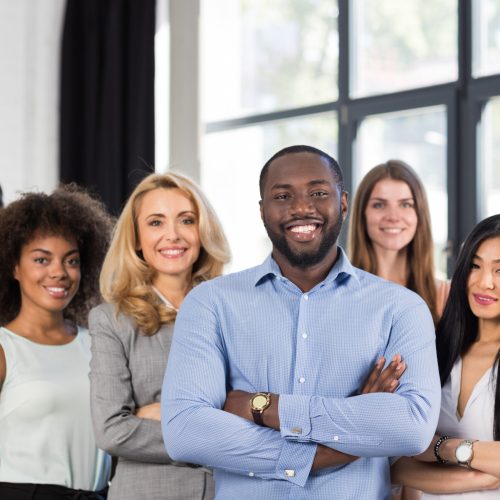 African American Businessman Boss With Group Of Business People In Creative Office, Successful Mix Race Man Leading Businesspeople Team Stand Folded Hands, Professional Staff African American Businessman Boss With Group Of Business People In Creative Office, Successful Mix Race Man Leading Businesspeople Team Stand Folded Hands, Professional Staff Happy Smiling